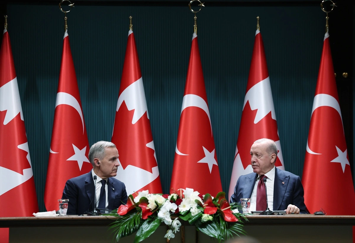 Erdoğan ve Carney görüşme masasında karşılıklı oturuyor