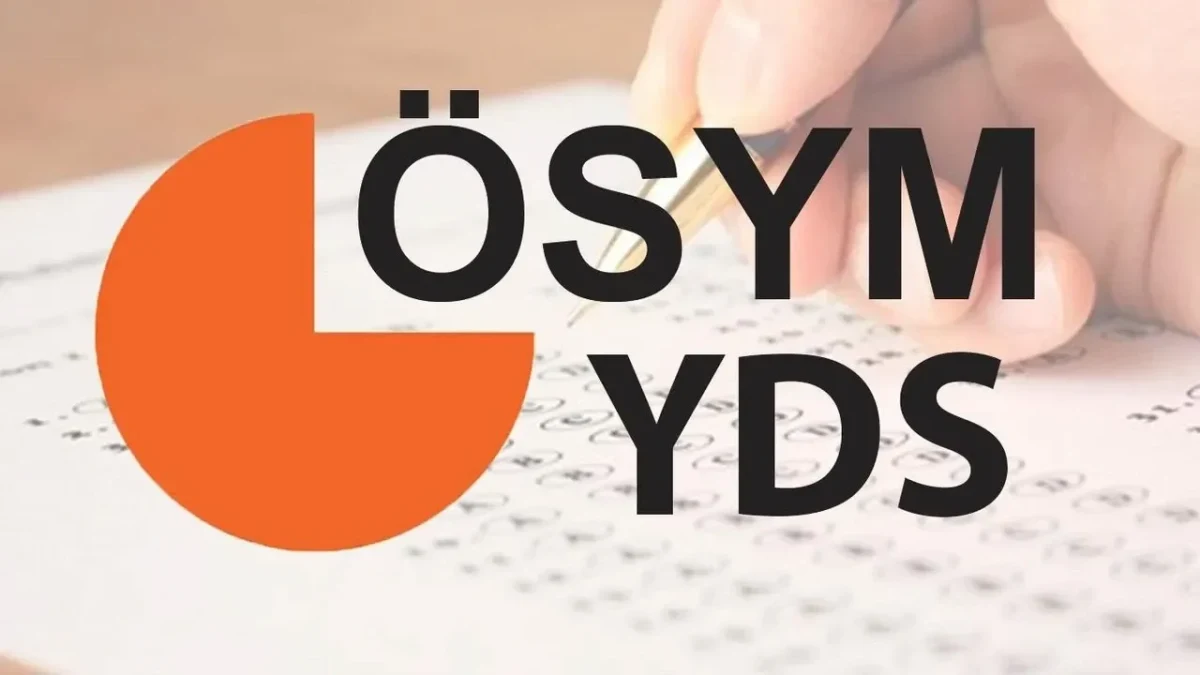 ÖSYM logosu ve sınav cevap kâğıdı üzerinde işaretleme yapan el