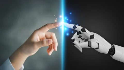 İnsan eli ile robot elinin parmak uçları ışıklı bir çizgi üzerinde birbirine dokunuyor